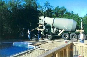 concrete truck pouring concrete